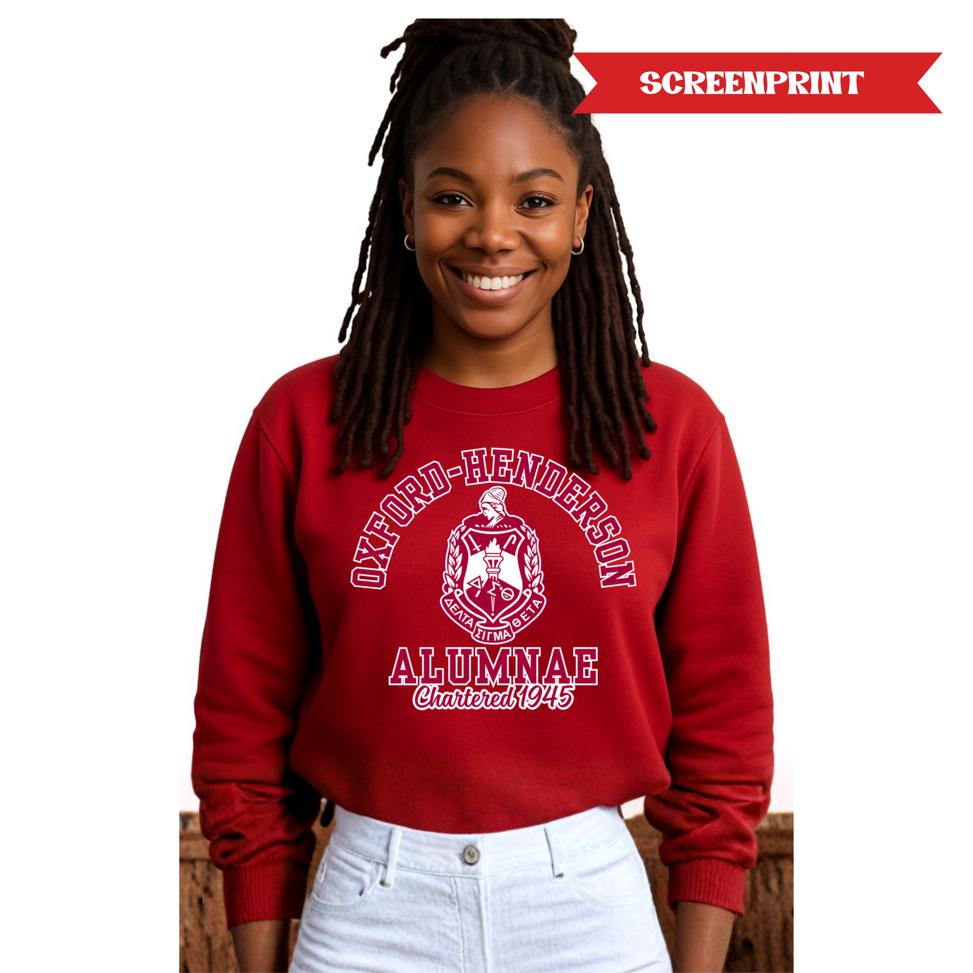 Person wearing a red sweatshirt with 'Oxford-Henderson Alumnae' print on a white background