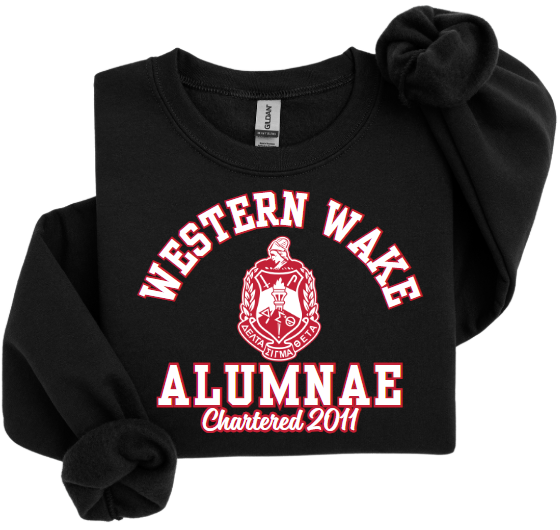 A collection of four sweatshirts in black, white, and red colors with the text 'Western Wake Alumnae' and a graphic emblem on the front.