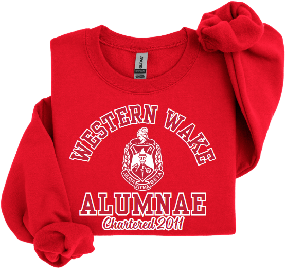A collection of four sweatshirts in black, white, and red colors with the text 'Western Wake Alumnae' and a graphic emblem on the front.