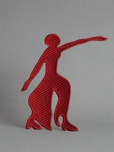 Red embroidered logo of a leaping dog on a beige background