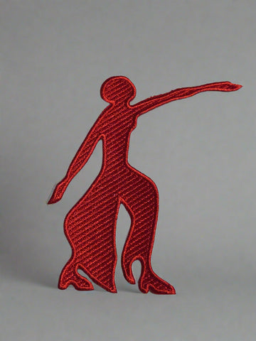 Red embroidered logo of a leaping dog on a beige background