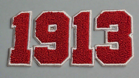 Red embroidered patch with a design on a beige background
