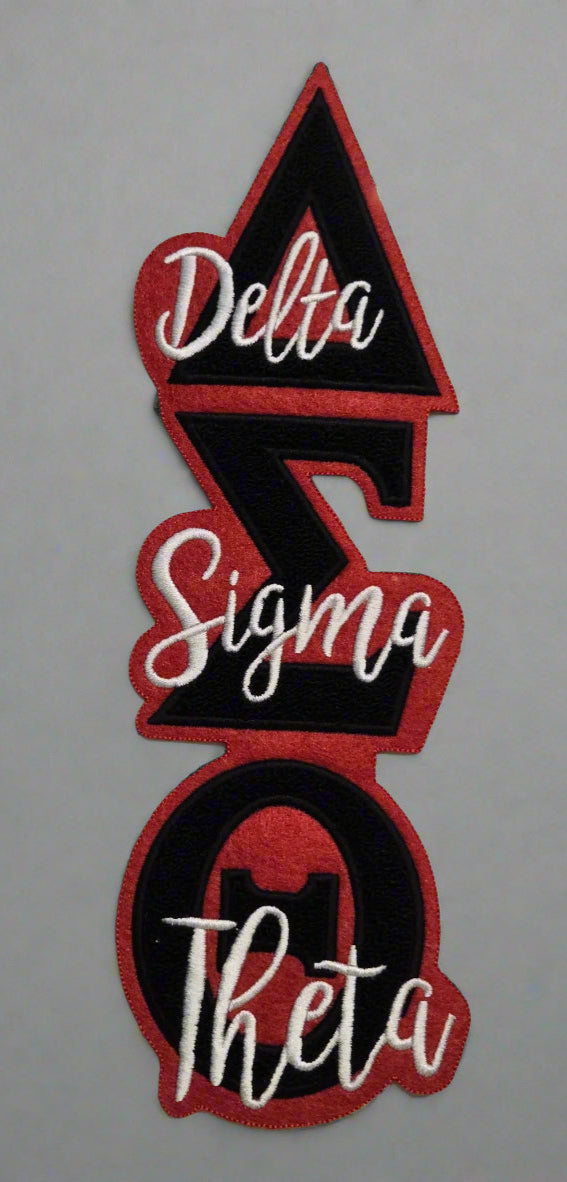 Delta Sigma Theta lettering on a white marble background