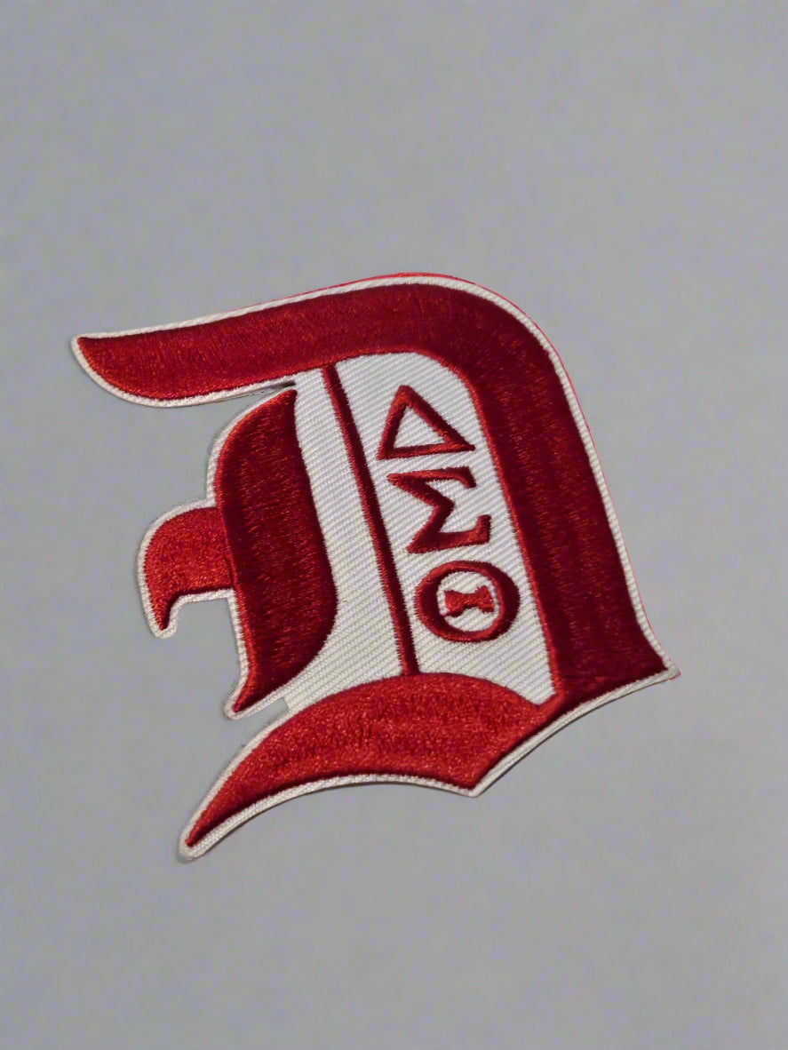 Red and white patch with a logo on a beige background