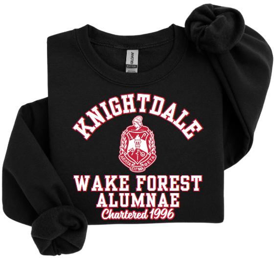 A collection of unisex sweatshirts in black, white, and red colors, featuring the text 'Knightdale Wake Forest Alumnae' and the logo of Delta Sigma Theta Sorority, Inc.