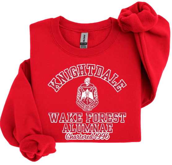 A red sweatshirt with 'KNIGHTDALE WAKE FOREST ALUMNAE' screenprint on the front.