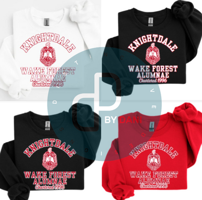 A collection of unisex sweatshirts in black, white, and red colors, featuring the text 'Knightdale Wake Forest Alumnae' and the logo of Delta Sigma Theta Sorority, Inc.